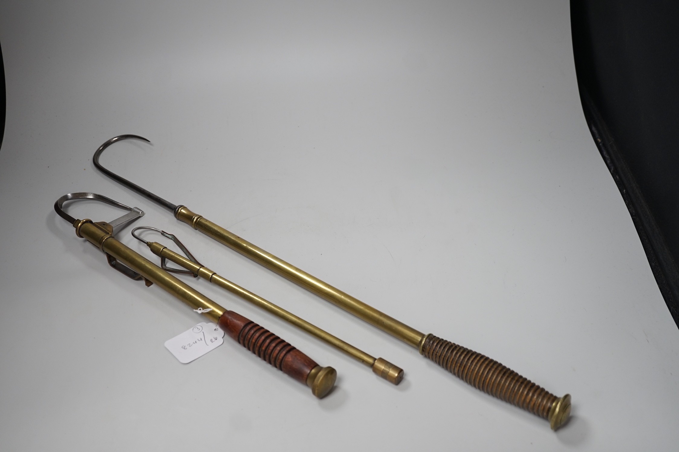 Three brass telescopic fishing gaffs